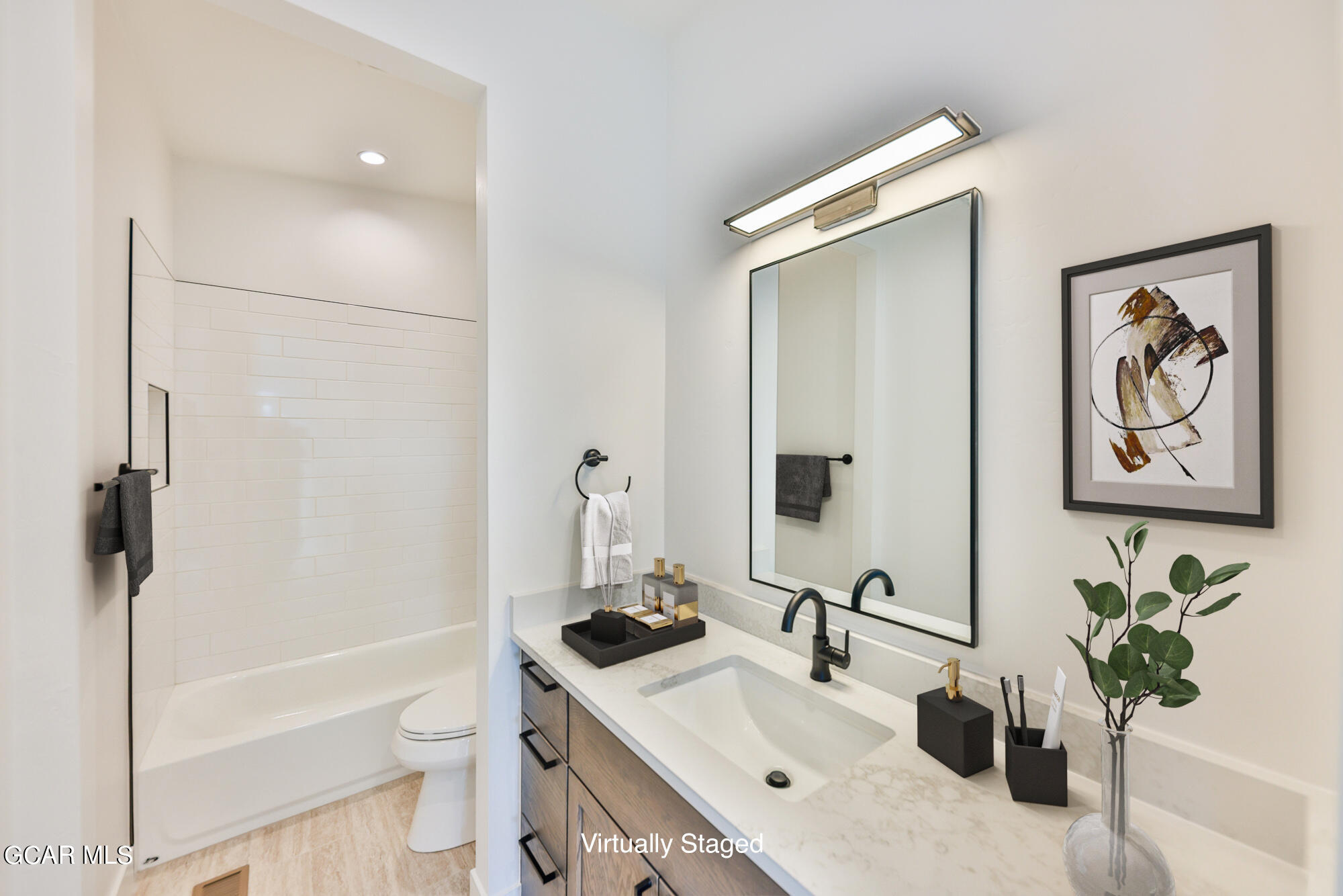 381 Bear Trail Winter Park, CO 80482 - Photo 18 of 38 a bathroom with a sink a toilet and shower