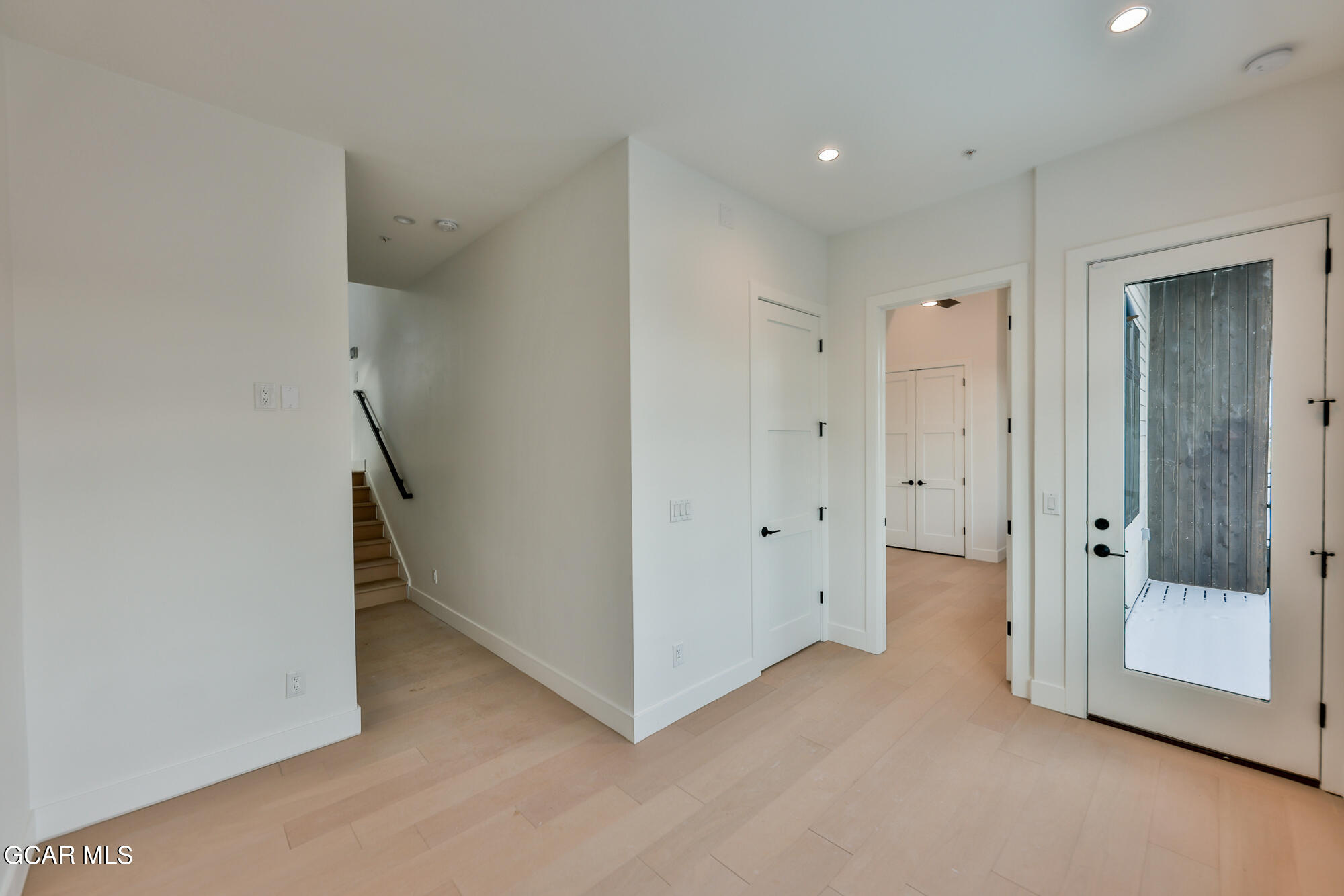 381 Bear Trail Winter Park, CO 80482 - Photo 23 of 38 a view of an empty room with a hallway
