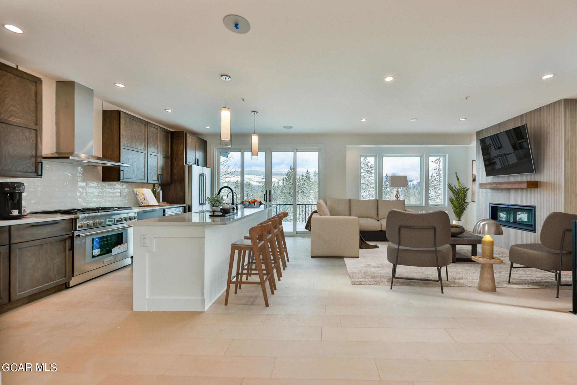 381 Bear Trail Winter Park, CO 80482 - Photo 5 of 38 a large kitchen with cabinets table and chairs
