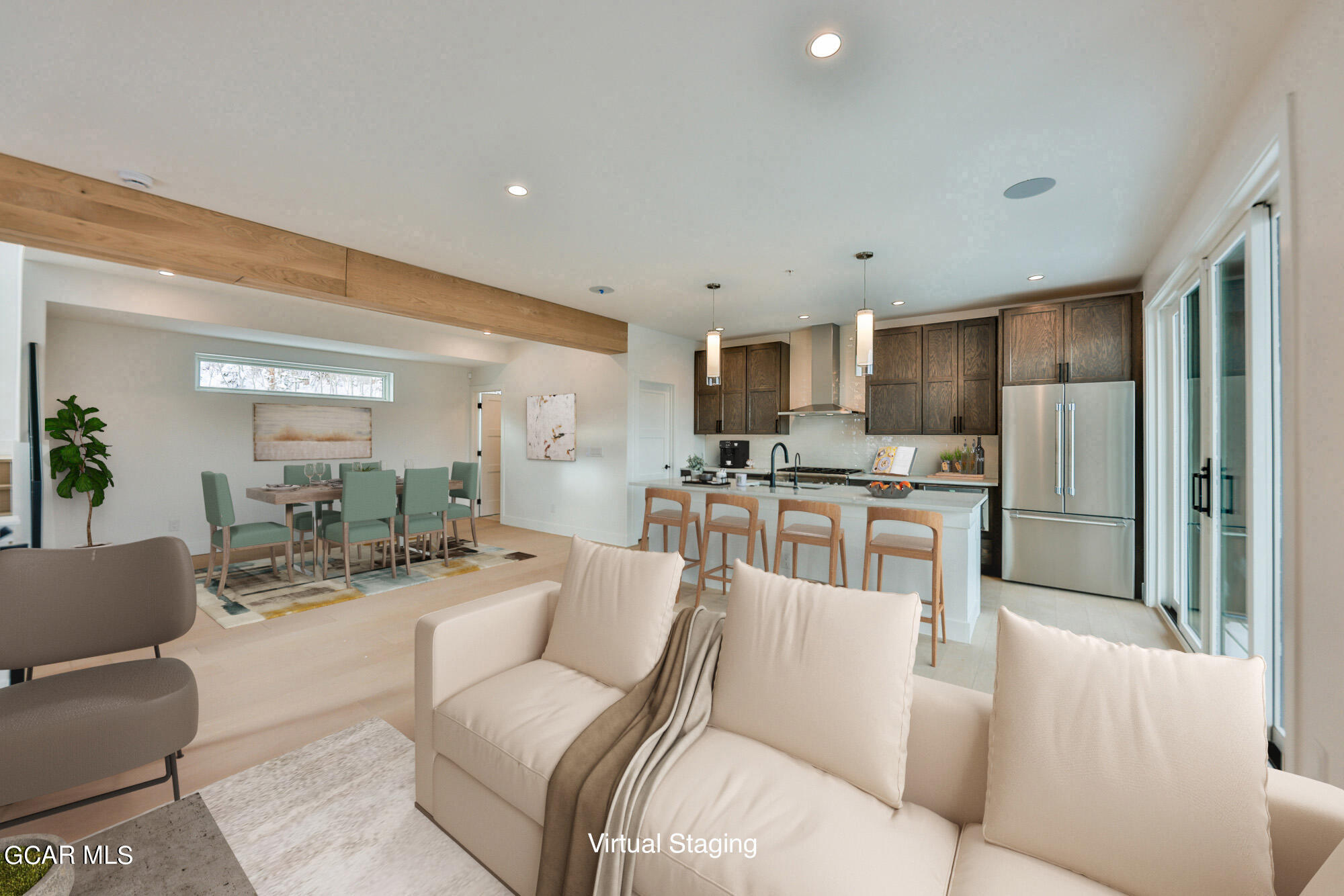 381 Bear Trail Winter Park, CO 80482 - Photo 8 of 38 a living room with furniture and a kitchen view