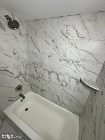 a bathroom with a bathtub