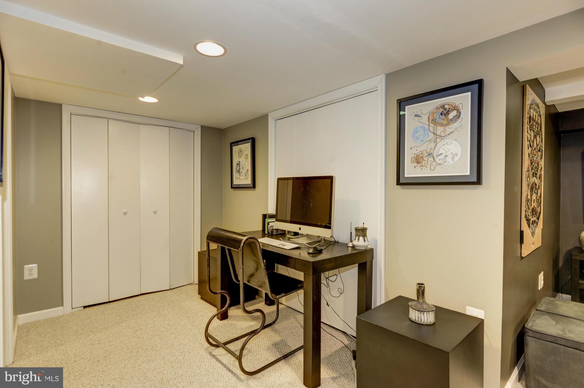 410 Hopkins Road Baltimore, MD 21212 - Photo 15 of 30 a view of a workspace with furniture and a window