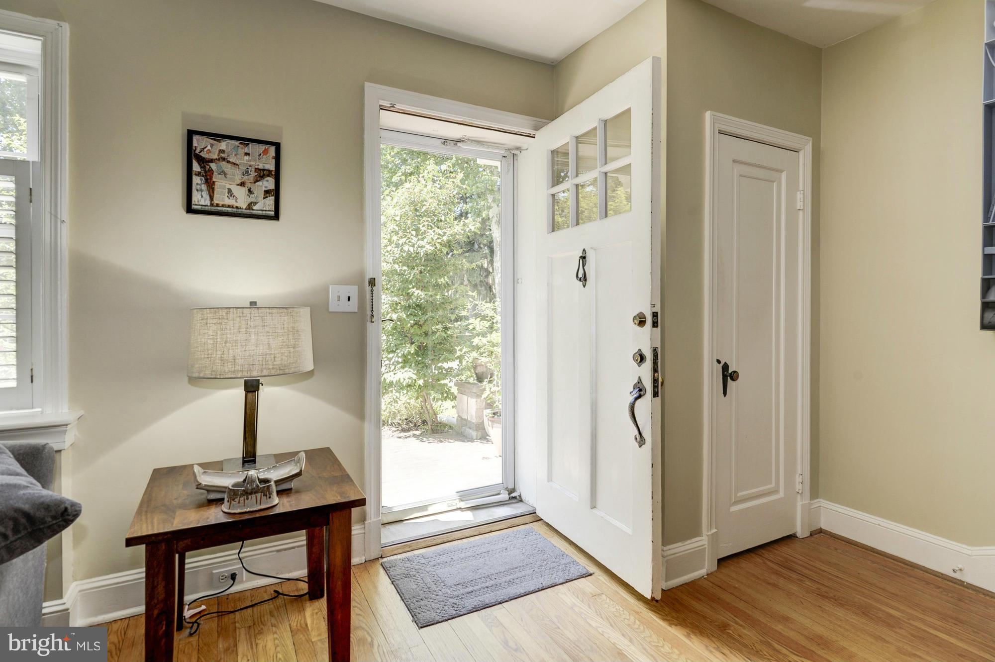 410 Hopkins Road Baltimore, MD 21212 - Photo 3 of 30 a view of a workspace with wooden floor and a window