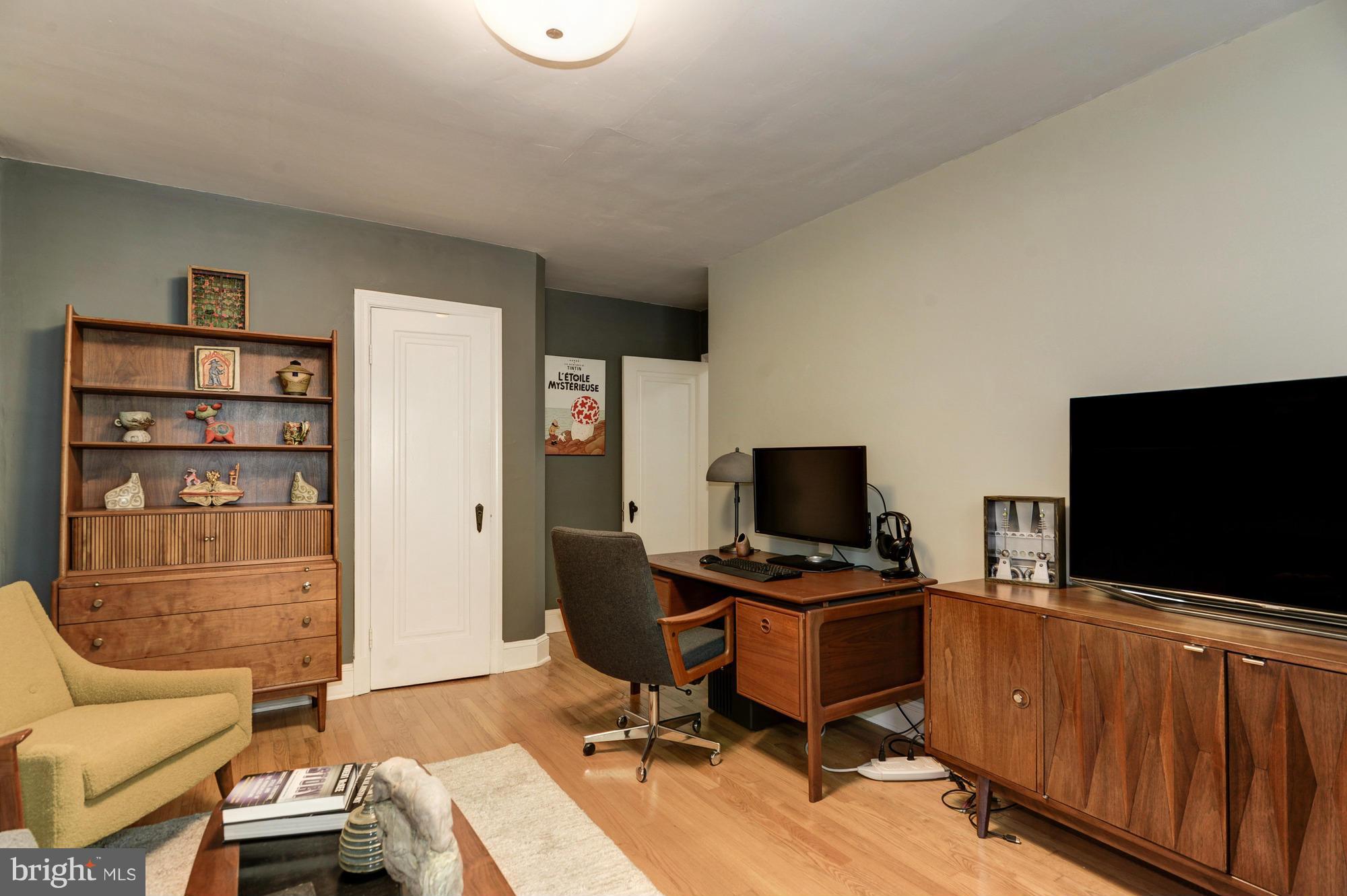 410 Hopkins Road Baltimore, MD 21212 - Photo 22 of 30 a view of a livingroom with workspace and a window