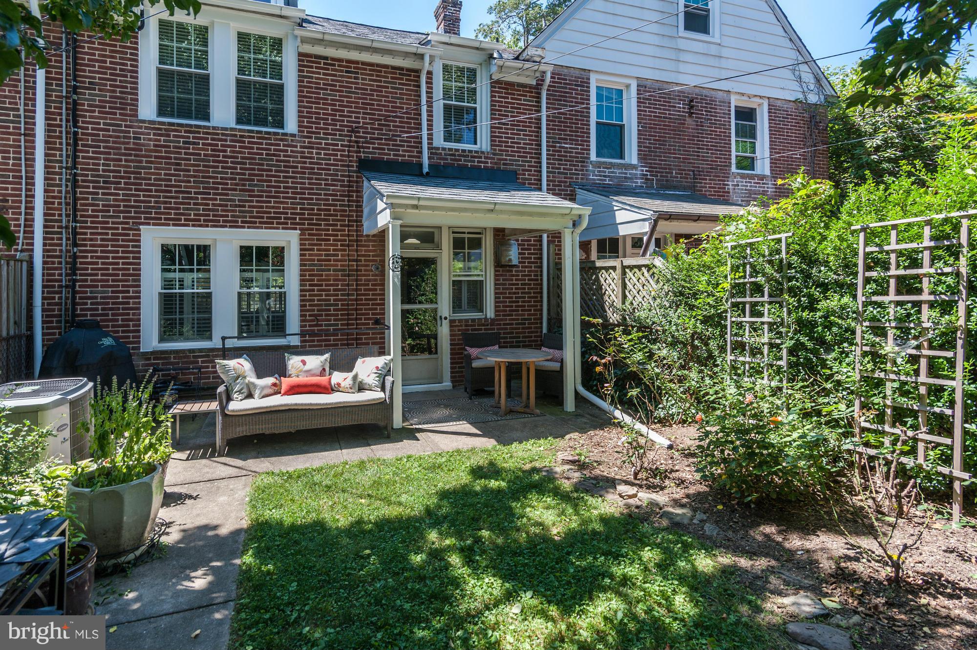 410 Hopkins Road Baltimore, MD 21212 - Photo 28 of 30 a view of a house with sitting area and garden