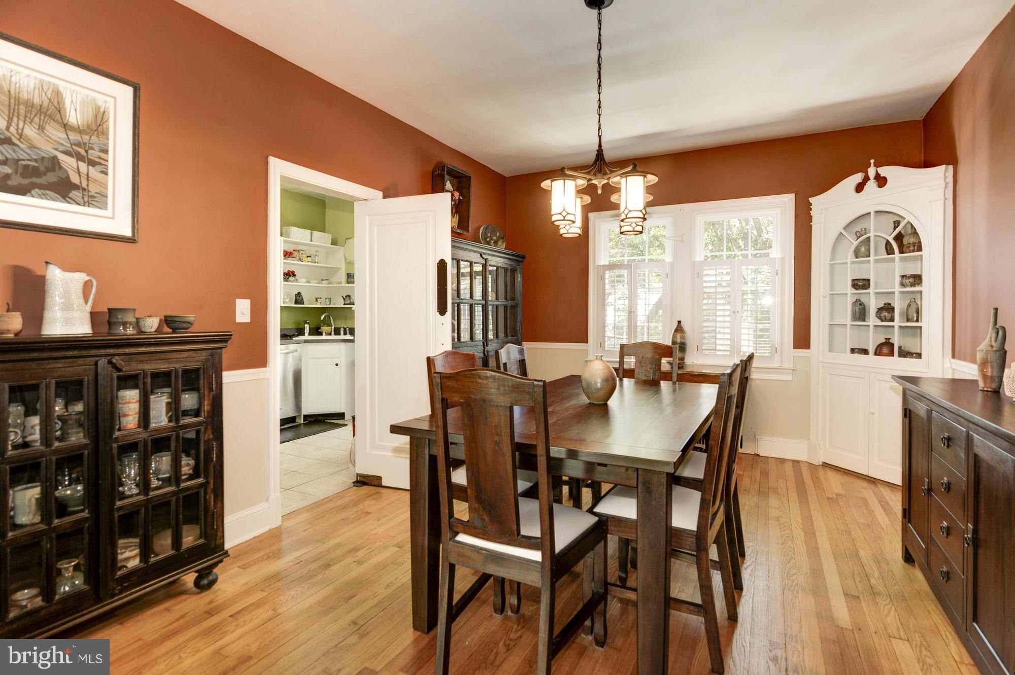 410 Hopkins Road Baltimore, MD 21212 - Photo 8 of 30 a view of a dining room with furniture window and wooden floor