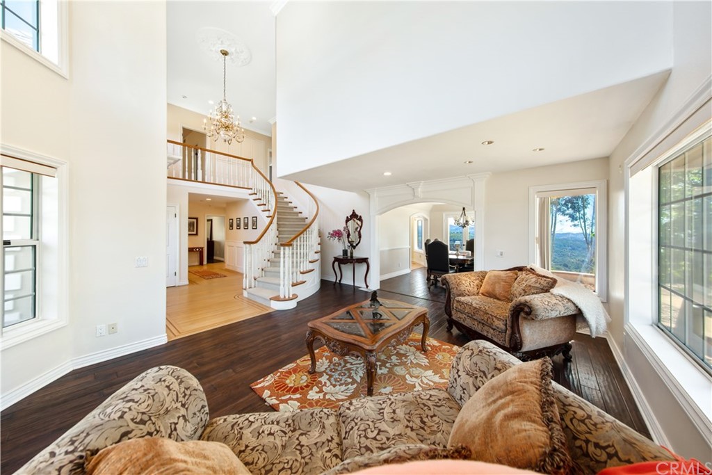 46250 Camaron Road Temecula, CA 92590 - Photo 14 of 46 a living room with furniture or couch and a wooden floor
