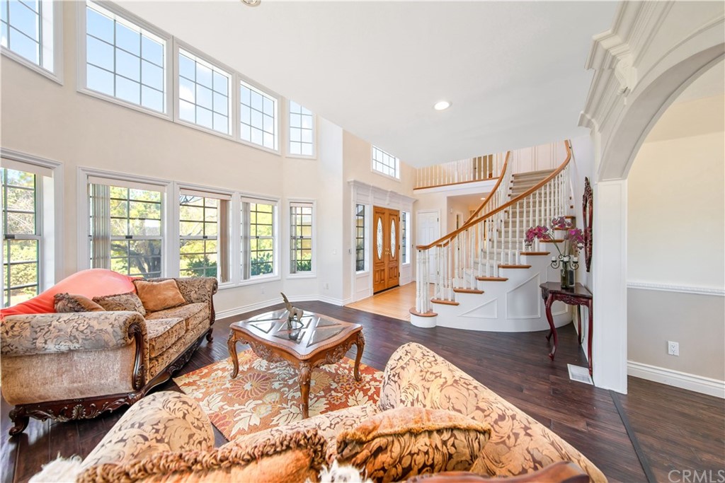 46250 Camaron Road Temecula, CA 92590 - Photo 15 of 46 a living room with furniture and floor to ceiling windows