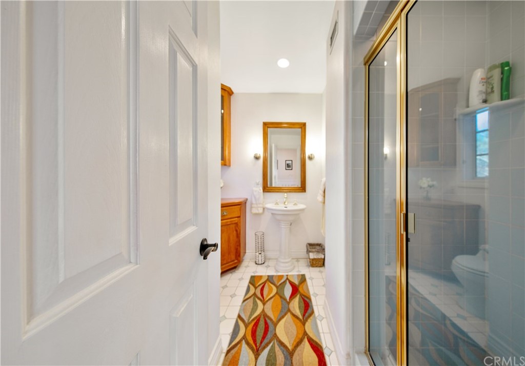 46250 Camaron Road Temecula, CA 92590 - Photo 23 of 46 a bathroom with a sink and a mirror