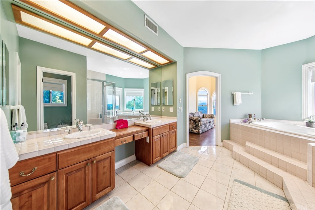 46250 Camaron Road Temecula, CA 92590 - Photo 37 of 46 a room with a large bed and a large window