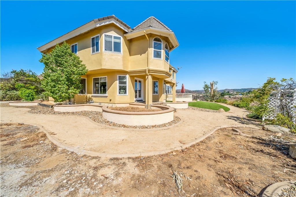 46250 Camaron Road Temecula, CA 92590 - Photo 43 of 46 a front view of a house with a yard