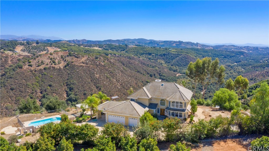 46250 Camaron Road Temecula, CA 92590 - Photo 45 of 46 an aerial view of a house with a garden