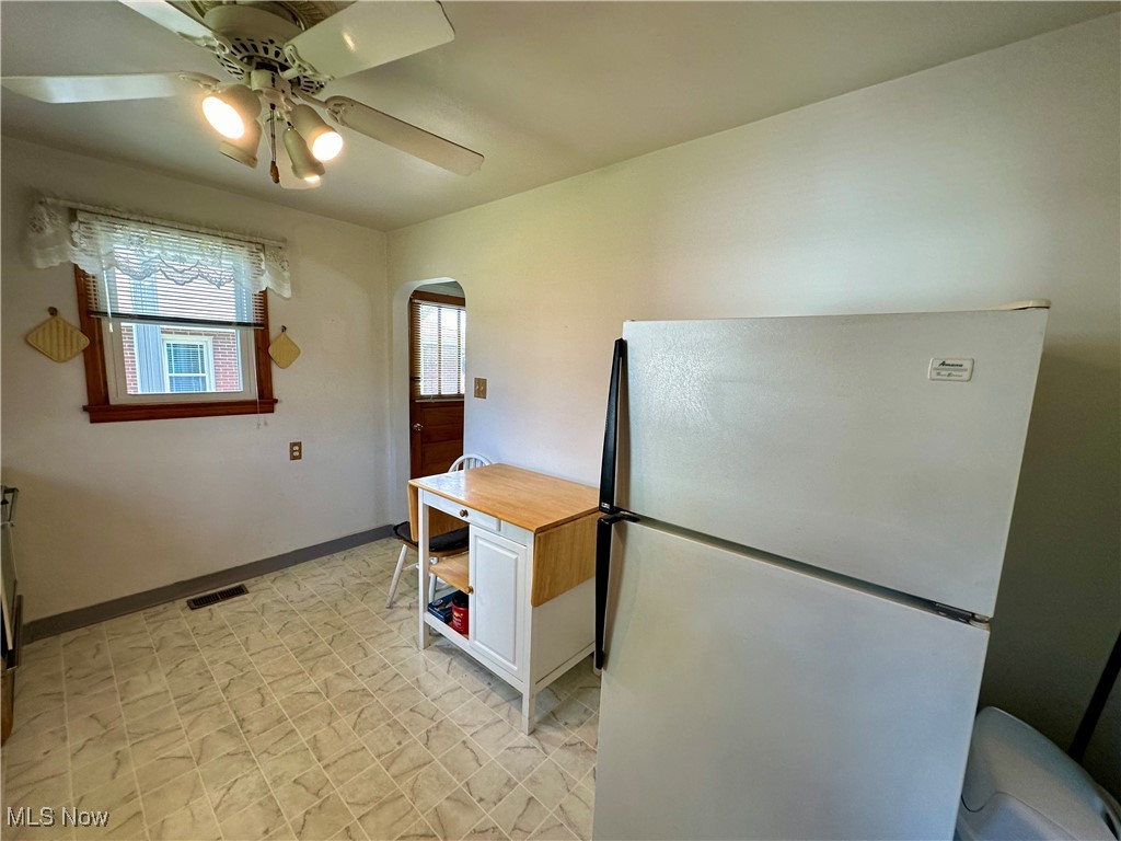 343 Raleigh Avenue Weirton, WV 26062 - Photo 14 of 46 Kitchen featuring wood counters, fridge, and ceiling fan