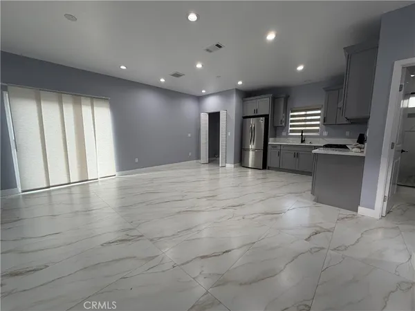 a view of a kitchen with a sink