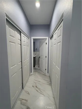 a bathroom with a shower and a sink