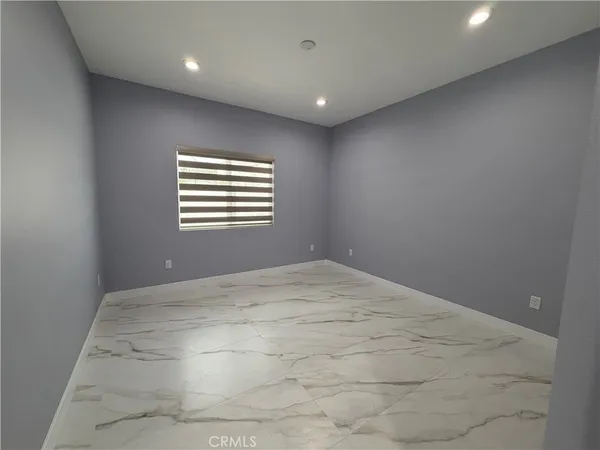 a view of empty room with a window