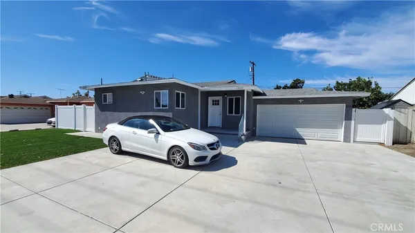 a car parked in front of a house