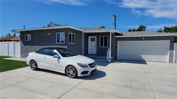 a car parked in front of a house