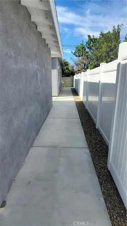 a view of a back yard of the house