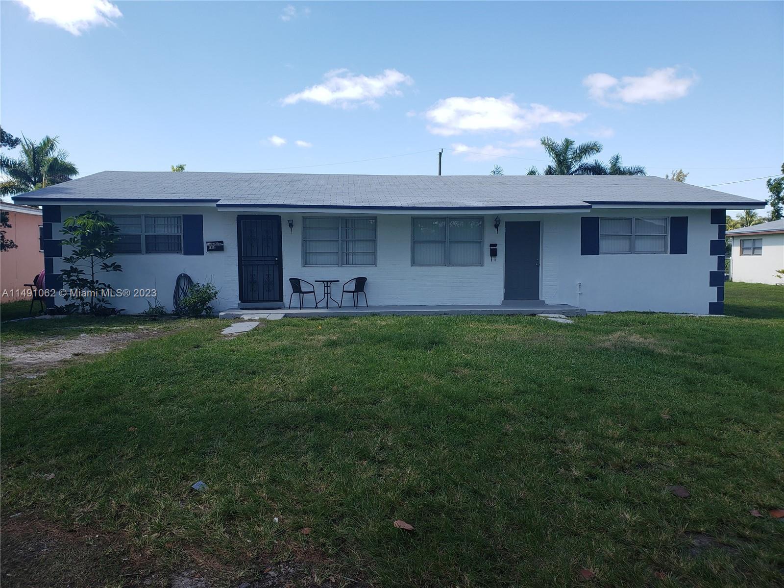 Miami-Dade County Miami, FL 33161 - Photo 2 of 31 a view of a yard in front of a house
