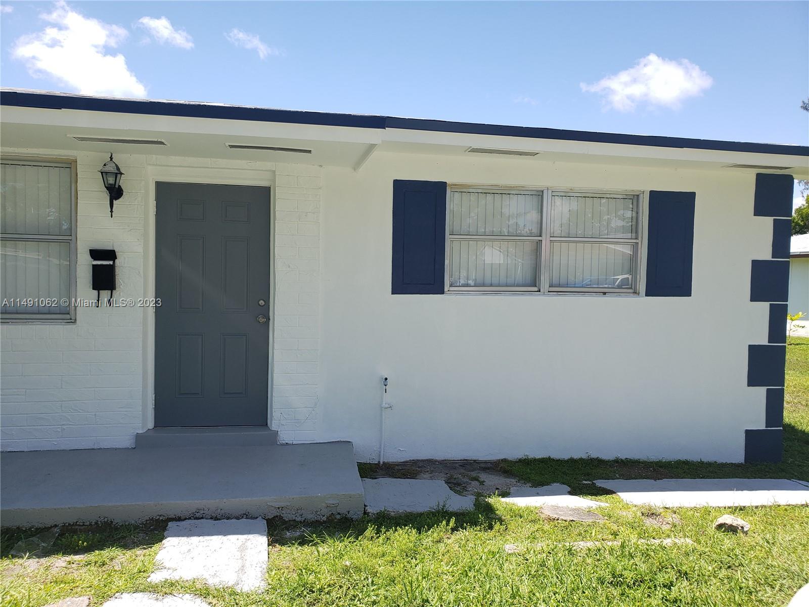 Miami-Dade County Miami, FL 33161 - Photo 21 of 31 a view of front door