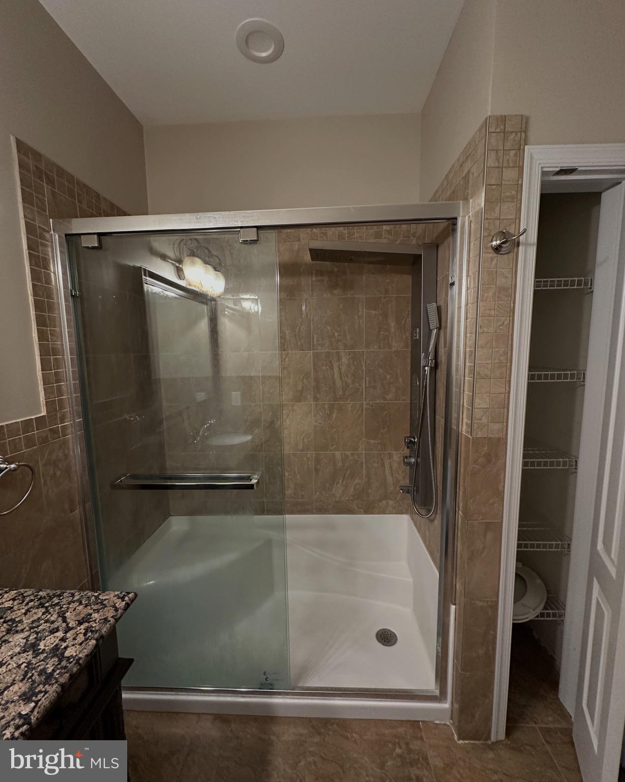 290 Byberry Road, Unit 2 Philadelphia, PA 19116 - Photo 4 of 12 a bathroom with a shower and a bath tub