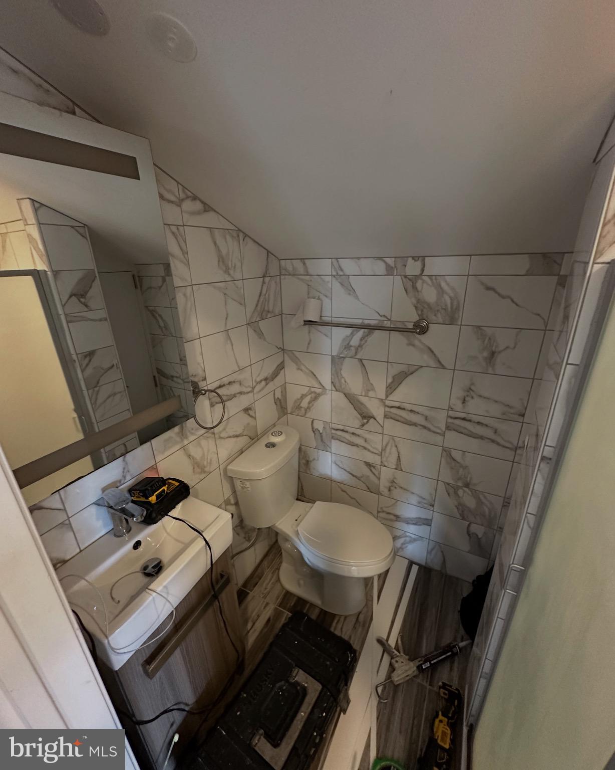 290 Byberry Road, Unit 2 Philadelphia, PA 19116 - Photo 5 of 12 a bathroom with a sink and a mirror