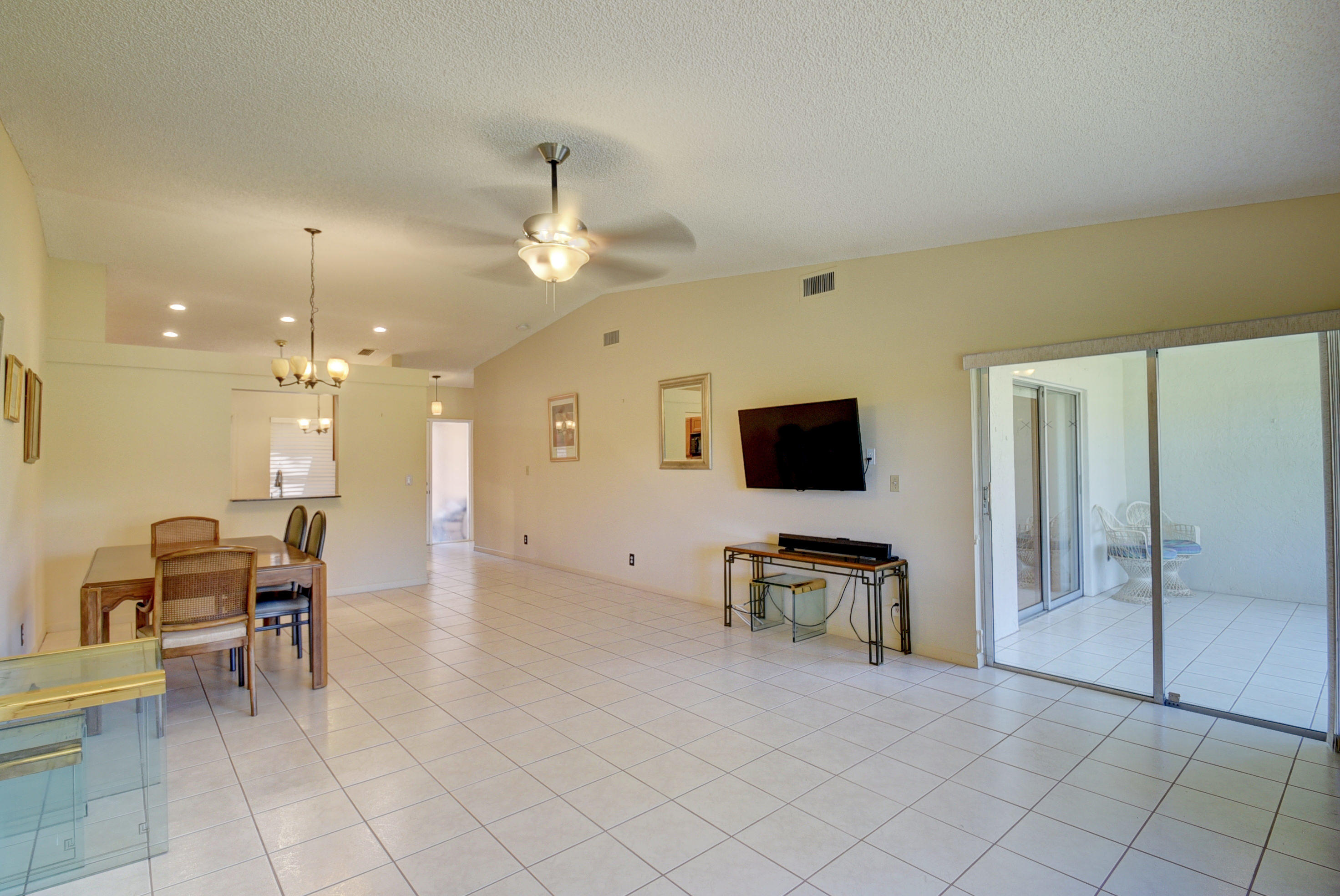 8187 Sweetbriar Way Boca Raton, FL 33496 - Photo 6 of 36 Sliders to the Patio