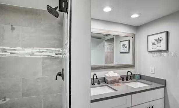 2 Booth Boulevard Safety Harbor, FL 34695 - Photo 8 of 9 a bathroom with a sink and a mirror