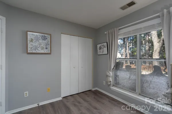 a large kitchen with stainless steel appliances granite countertop a refrigerator and a stove top oven