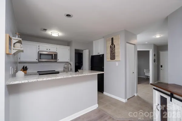 a bedroom with a bed and closet