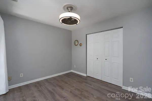 a view of a furniture and floor to ceiling window