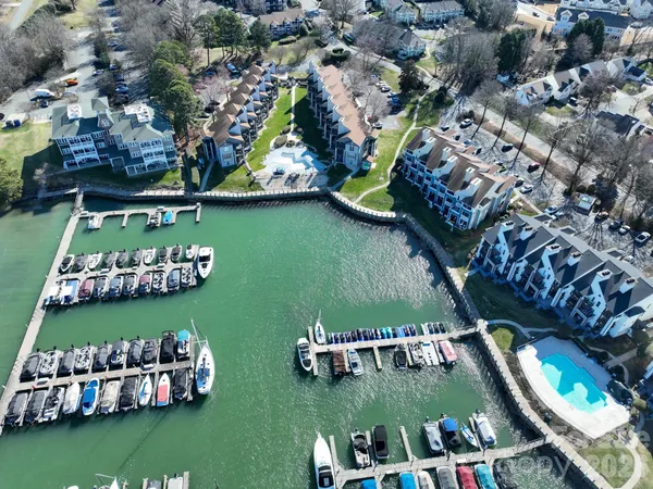 an aerial view of a house with outdoor space