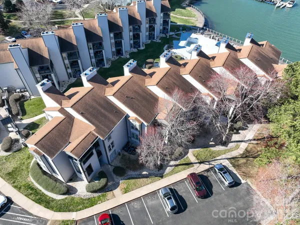 an aerial view of a houses with outdoor space