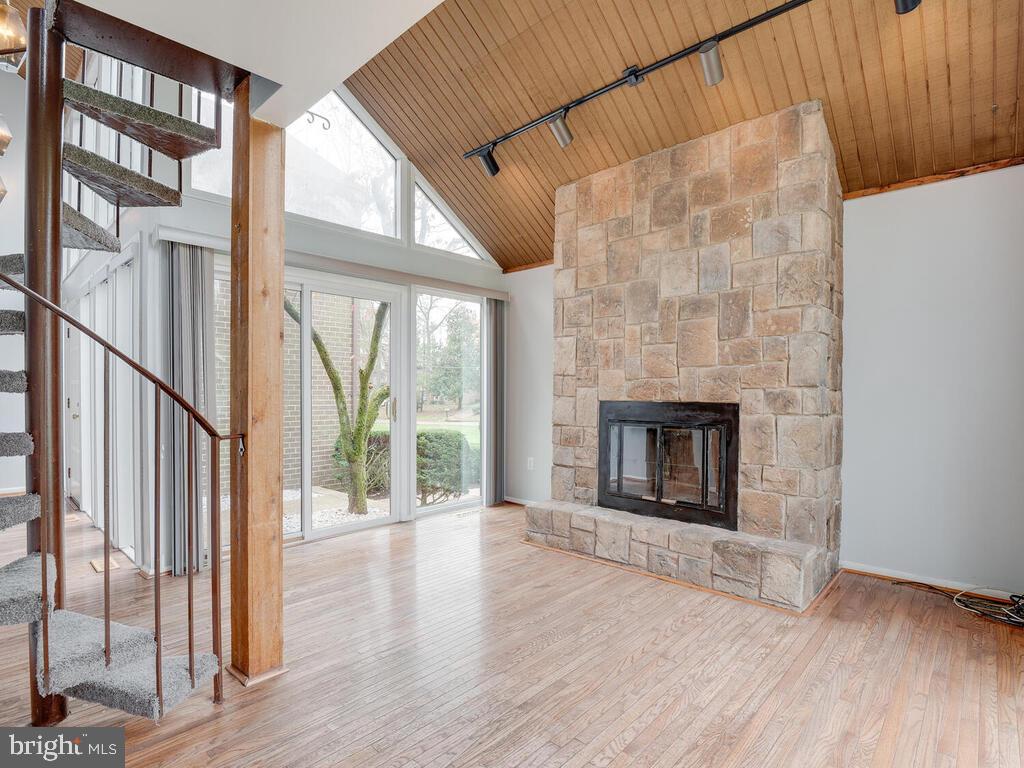 5316 Tolson Road Temple Hills, MD 20748 - Photo 14 of 69 View of spiral staircase and two-story windows