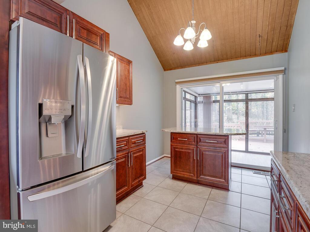 5316 Tolson Road Temple Hills, MD 20748 - Photo 33 of 69 Granite counter top island with view of lanai