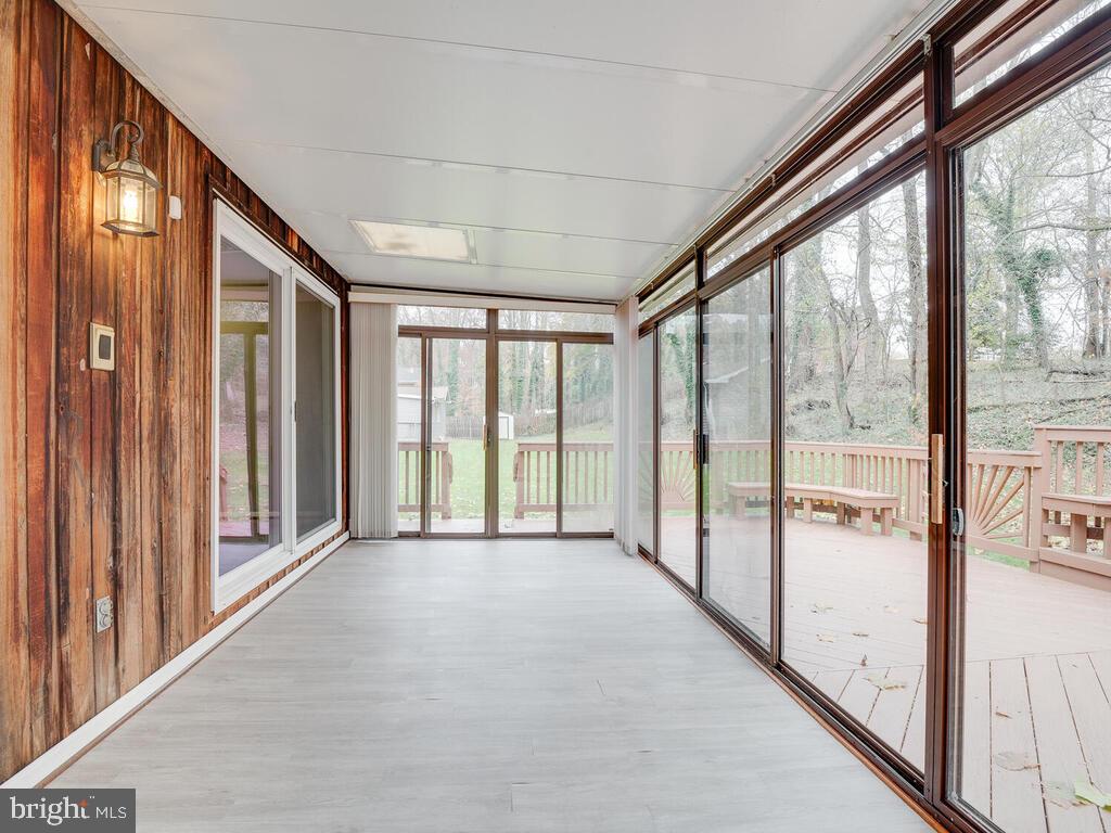 5316 Tolson Road Temple Hills, MD 20748 - Photo 34 of 69 Glass enclosed step-down lanai