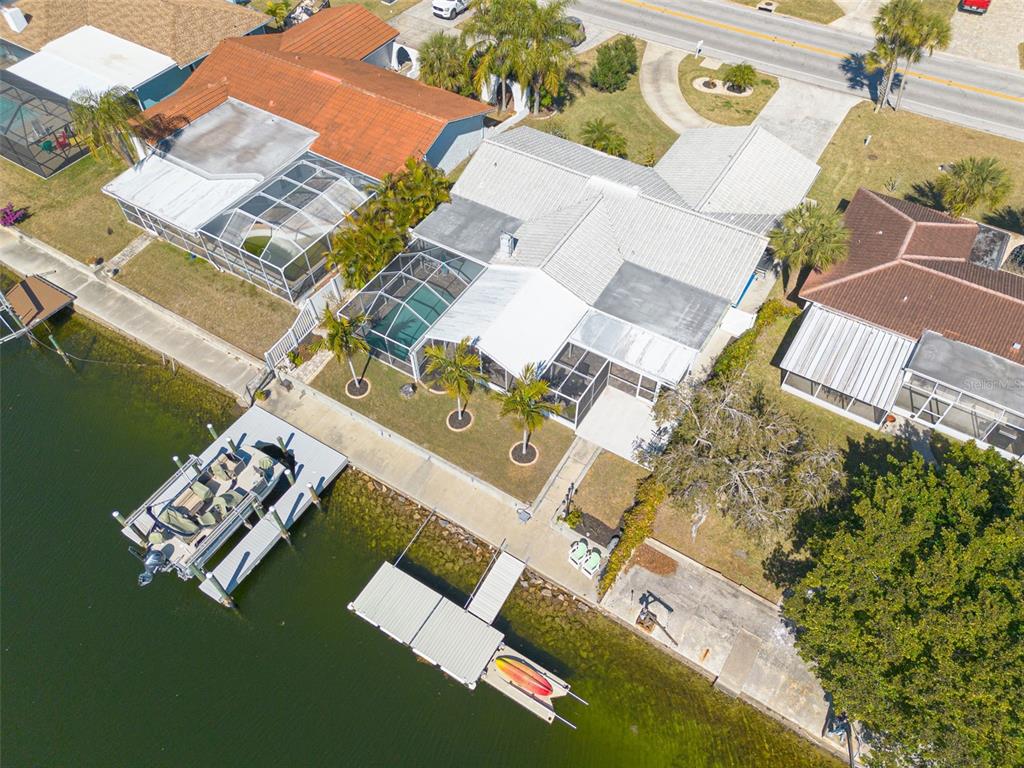 3608 Floramar Terrace New Port Richey, FL 34652 - Photo 1 of 43 an aerial view of a house with a ocean view