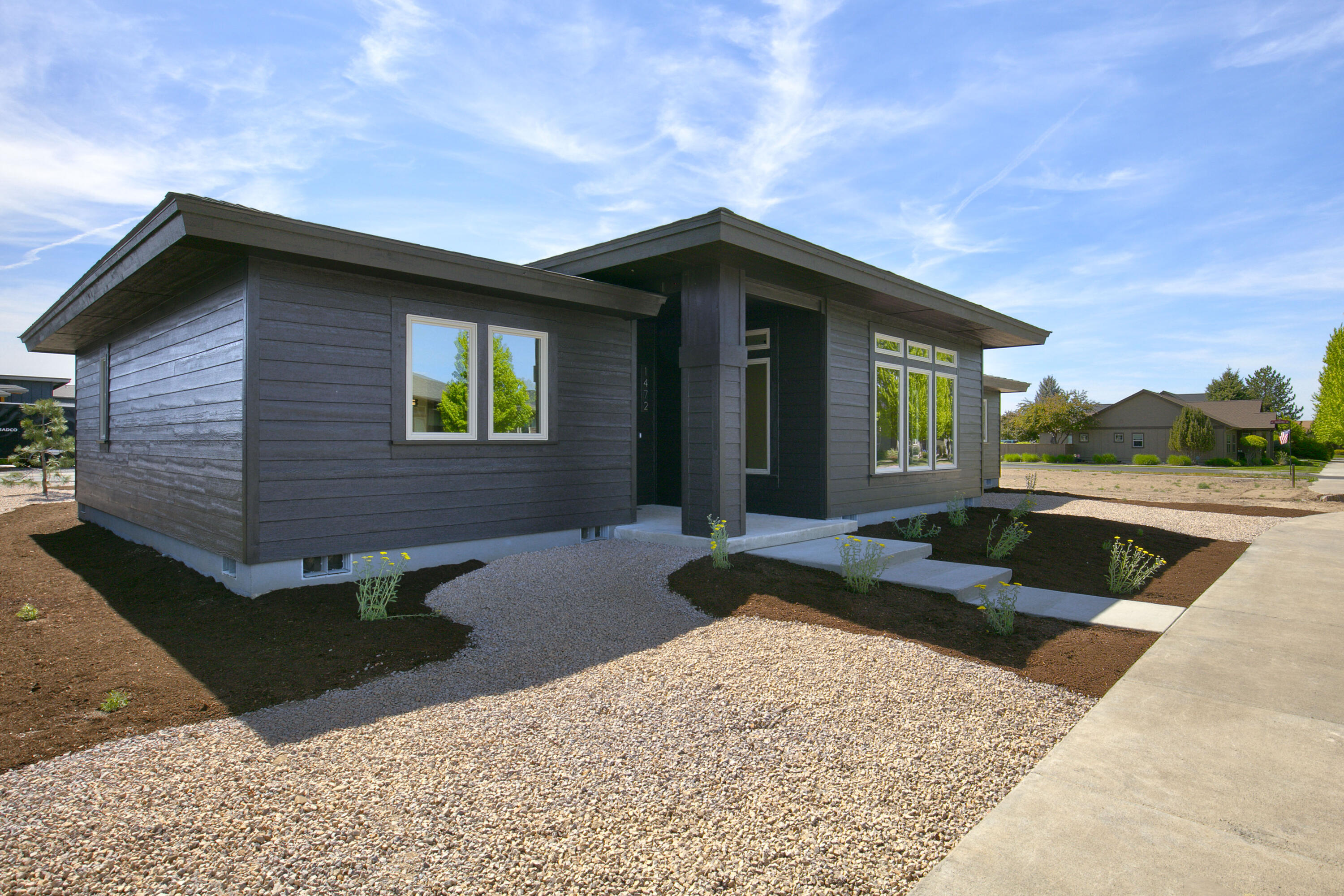 1472 Northeast Hudspeth Road Prineville, OR 97754 - Photo 2 of 26 a house view with a backyard space