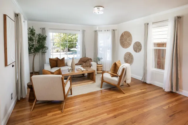 a kitchen with a table and chairs in it