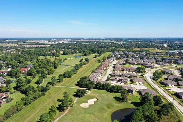an aerial view of a houses with outdoor space
