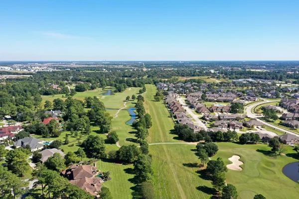 an aerial view of a city with lots of residential buildings