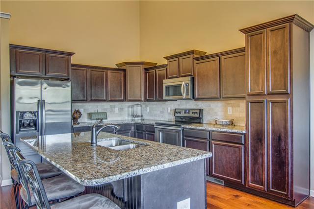 2021 Lincoln Road Spring Hill, TN 37174 - Photo 6 of 19 Open kitchen with granite countertops. Large island.