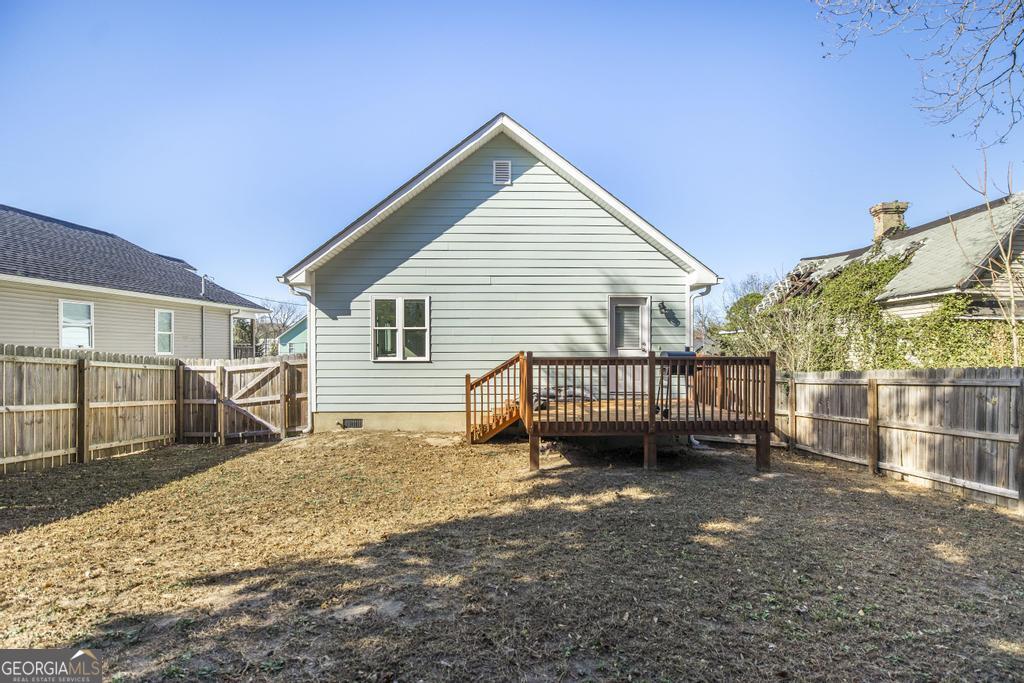 338 Monroe Street Macon, GA 31201 - Photo 23 of 25 a view of a house with a yard