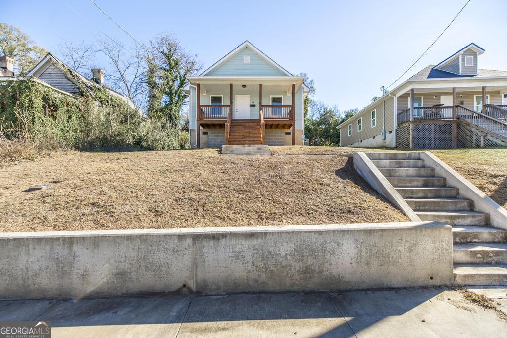 338 Monroe Street Macon, GA 31201 - Photo 3 of 25 a view of outdoor space with yard