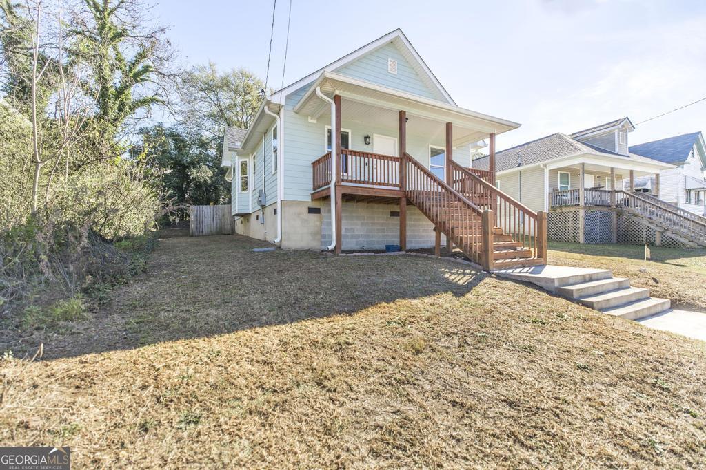 338 Monroe Street Macon, GA 31201 - Photo 5 of 25 a view of a house with a yard