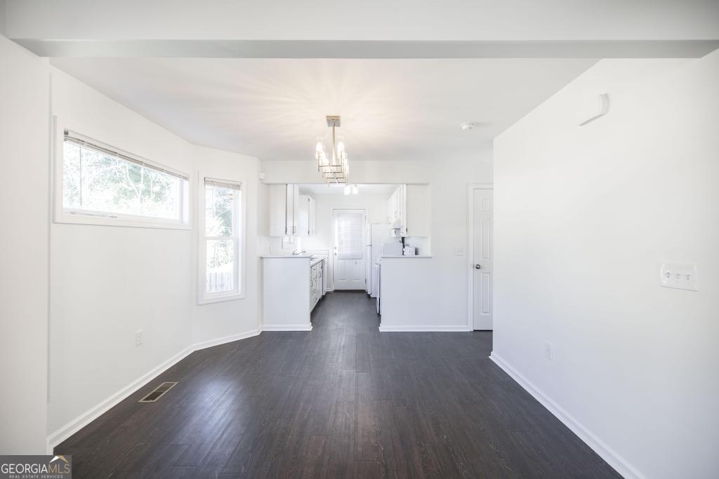 338 Monroe Street Macon, GA 31201 - Photo 10 of 25 a view of a livingroom with wooden floor