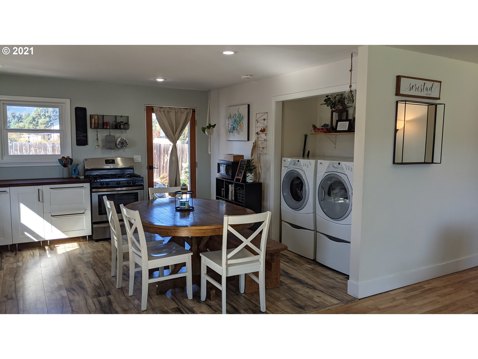 1672 Tucker Road Hood River, OR 97031 - Photo 4 of 15 a kitchen with a table and chairs in it