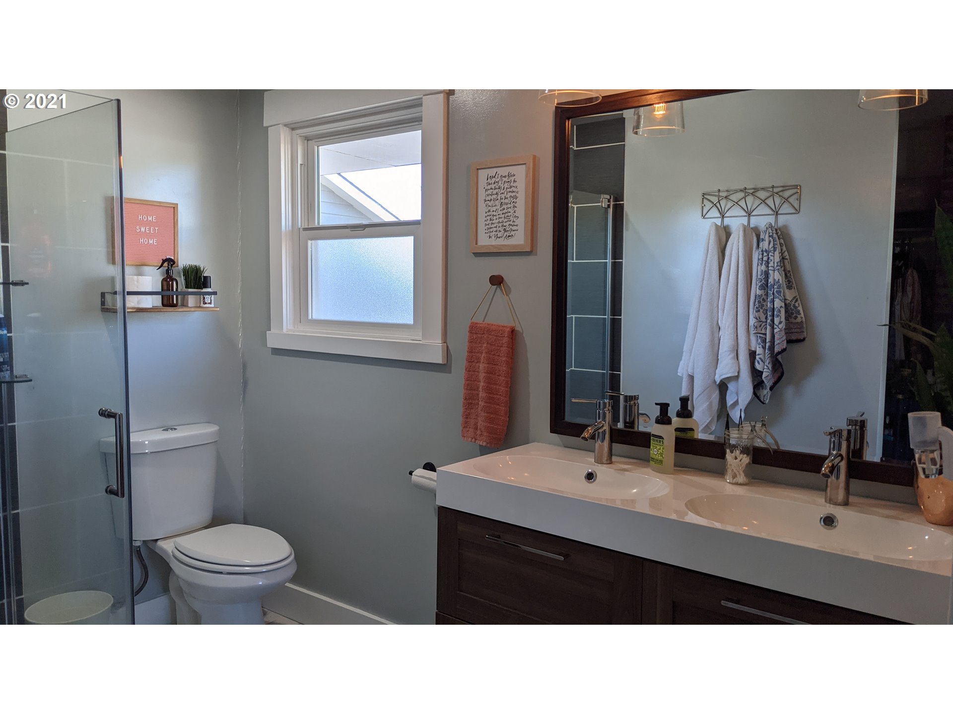 1672 Tucker Road Hood River, OR 97031 - Photo 7 of 15 a bathroom with a sink a toilet and a mirror
