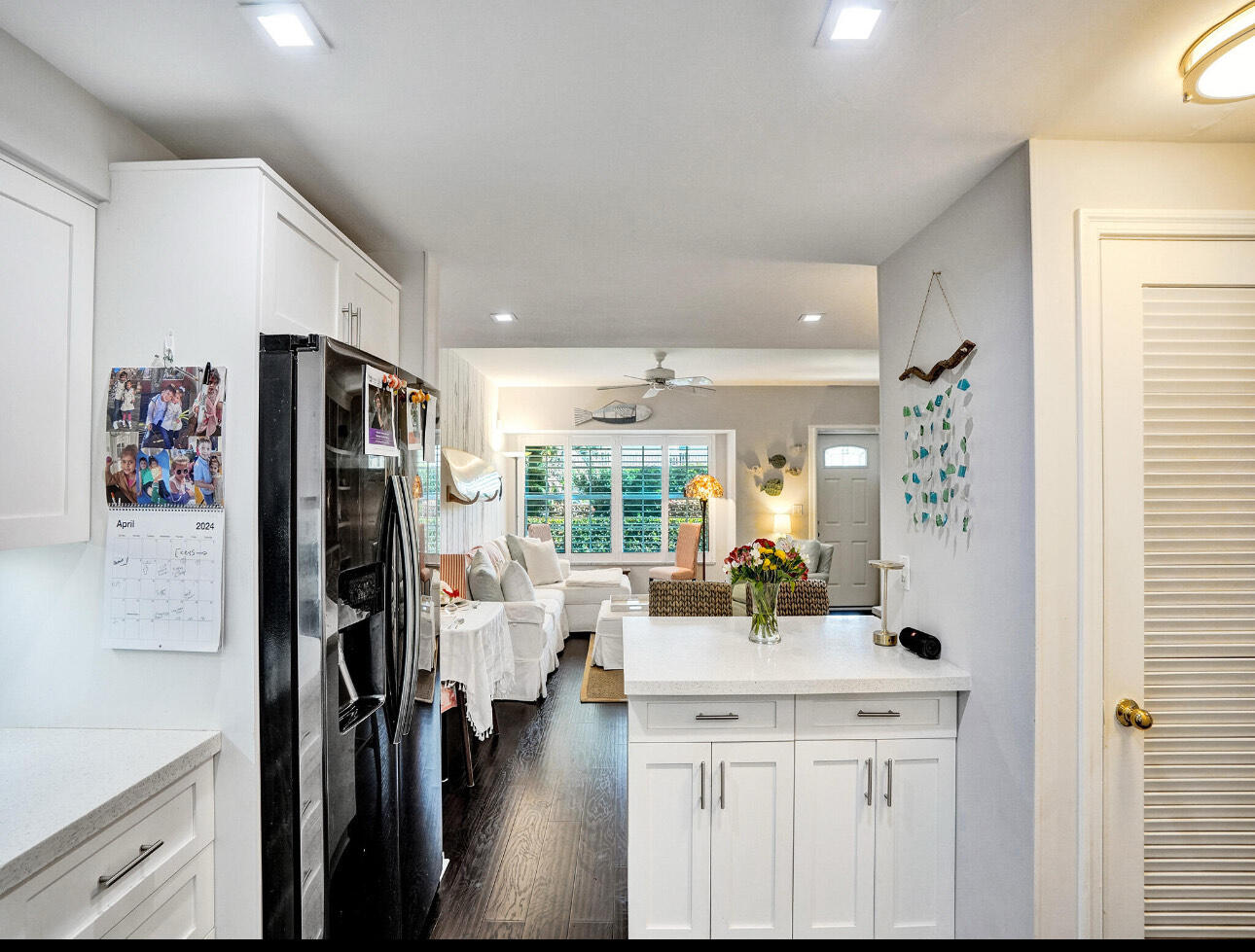 6590 North Ocean Boulevard, Unit 9 Ocean Ridge, FL 33435 - Photo 11 of 18 a view of a kitchen with refrigerator and workspace